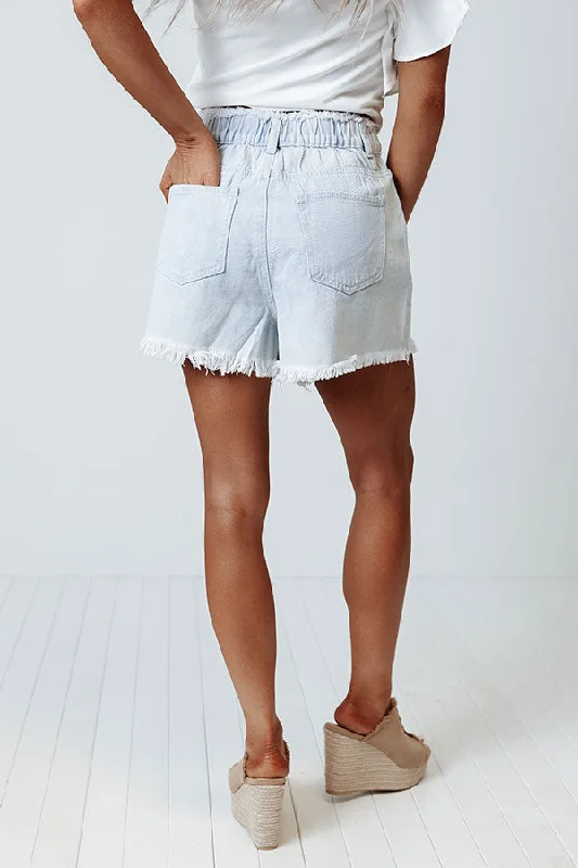 the-toori-high-waist-frayed-shorts-in-light-wash